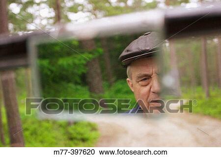 Man in old T-Ford 1923 driving on gravel way. Hudiksvall. H? lsingland. Sweden View Large Photo Image Stock Image - Man in old T-Ford 1923 driving on gravel way. Hudiksvall. H? lsingland. Sweden. Fotosearch