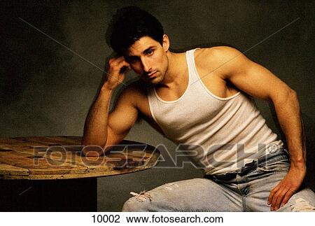 Man in tee shirt View Large Photo Image Stock Image - Man in tee shirt. Fotosearch