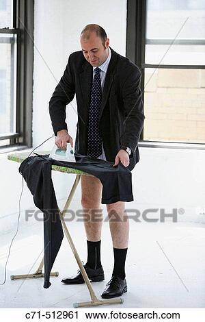 Man in underwear ironing his clothes View Large Photo Image Stock Image - Man in underwear ironing his clothes. Fotosearch