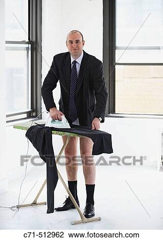 Man in underwear ironing his clothes View Large Photo Image Stock Image - Man in underwear ironing his clothes. Fotosearch