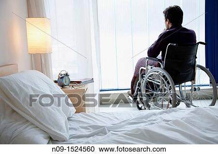 Man in wheelchair View Large Photo Image Stock Image - Man in wheelchair. Fotosearch