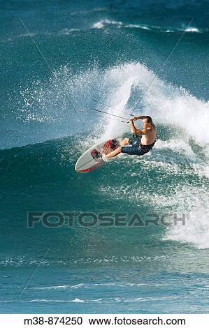 Man kiteboarding in Maui, Hawaii View Large Photo Image Stock Image - Man kiteboarding in Maui, Hawaii. Fotosearch