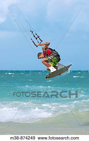 Man kiteboarding in Maui, Hawaii View Large Photo Image Stock Photo - Man kiteboarding in Maui, Hawaii. Fotosearch