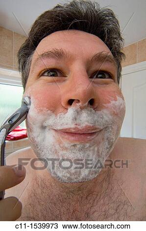 man late thirties 30's wet shaving with shaving lather on face about to shave View Large Photo Image Stock Image - man late thirties 30's wet shaving with shaving lather on face about to shave. Fotosearch