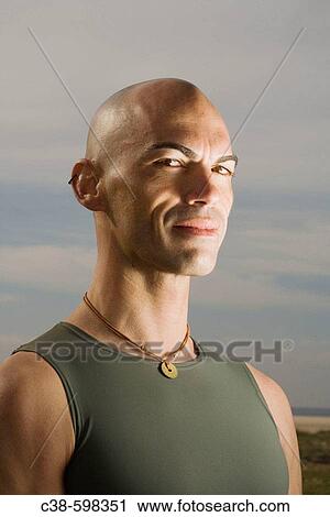 Man Looking At Camera With Unwavering Determination View Large Photo Image Stock Image - Man Looking At Camera With Unwavering Determination. Fotosearch