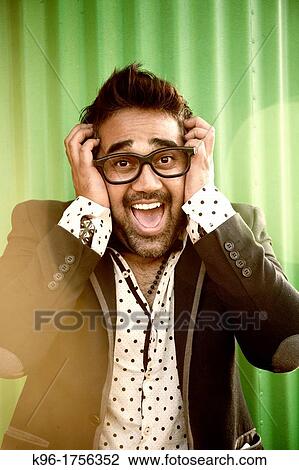 Man looking at the camera with a funny screaming expression View Large Photo Image Stock Image - Man looking at the camera with a funny screaming expression. Fotosearch