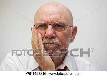 Stock Photograph - Man looking concerned. Fotosearch