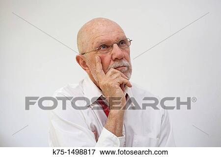 Man lost in his thoughts View Large Photo Image Stock Photo - Man lost in his thoughts. Fotosearch