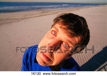 Man making face View Large Photo Image Stock Image - Man making face. Fotosearch