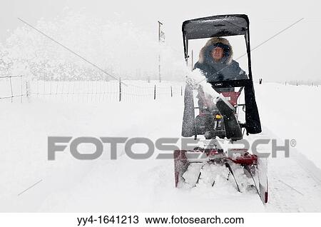 Man male using push Craftsman snow blower during heavy snow storm, Cocolalla, Idaho, USA View Large Photo Image Stock Image - Man male using push Craftsman snow blower during heavy snow storm, Cocolalla, Idaho, USA. Fotosearch