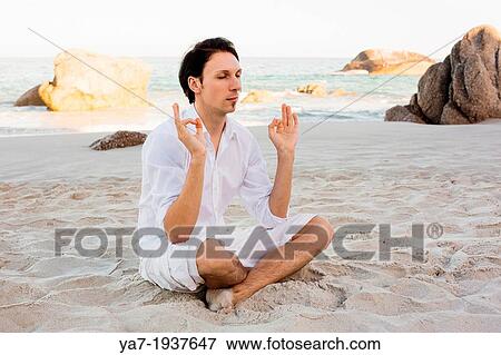 Man Meditating on Beach View Large Photo Image Stock Photo - Man Meditating on Beach. Fotosearch
