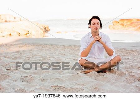Man Meditating on Beach View Large Photo Image Stock Photograph - Man Meditating on Beach. Fotosearch