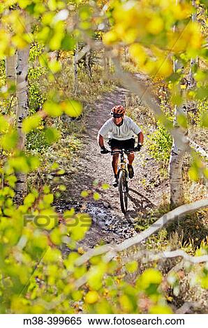 Man mount biking in Sun Valley, Idaho. USA View Large Photo Image Stock Photography - Man mount biking in Sun Valley, Idaho. USA. Fotosearch