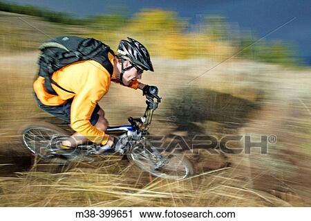 Man mt. biking in Sun Valley, Idaho. USA View Large Photo Image Stock Image - Man mt. biking in Sun Valley, Idaho. USA. Fotosearch