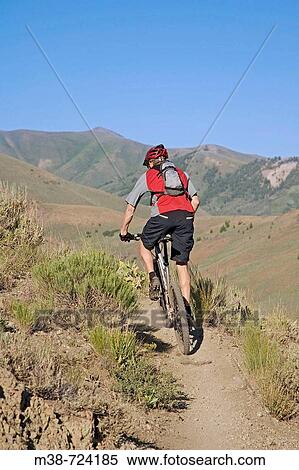 Man mt biking, Sun Valley, Idaho, USA. View Large Photo Image Stock Photography - Man mt biking, Sun Valley, Idaho, USA.. Fotosearch
