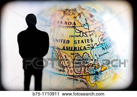 man observing the globe, United States of America View Large Photo Image Stock Image - man observing the globe, United States of America. Fotosearch