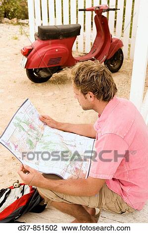 Man on a country trip with his scooter View Large Photo Image Stock Image - Man on a country trip with his scooter. Fotosearch