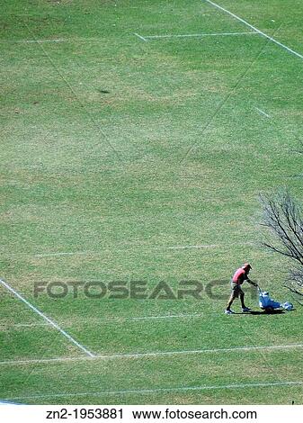 Man on a soccer field, Alice Springs, Australia. View Large Photo Image Stock Image - Man on a soccer field, Alice Springs, Australia.. Fotosearch