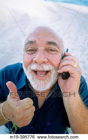 man on cell phone giving? thumbs-up? View Large Photo Image Stock Photograph - man on cell phone giving? thumbs-up?. Fotosearch