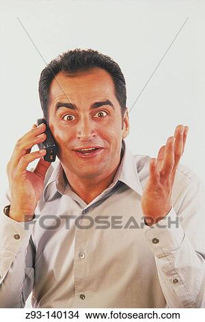 Man on cell phone View Large Photo Image Picture - Man on cell phone. Fotosearch