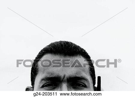 Man on cell phone View Large Photo Image Stock Image - Man on cell phone. Fotosearch