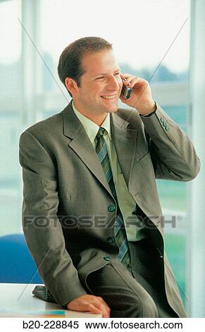 Man on cell phone View Large Photo Image Stock Photography - Man on cell phone. Fotosearch