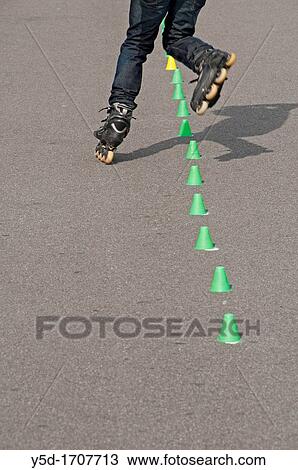 Man on roller skates, street in Geneva, Switzerland, Europe View Large Photo Image Stock Image - Man on roller skates, street in Geneva, Switzerland, Europe. Fotosearch
