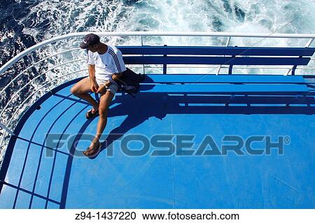 Man on ship deck View Large Photo Image Stock Image - Man on ship deck. Fotosearch