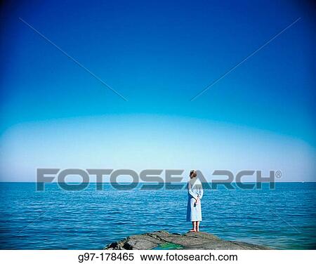 Stock Photography - Man on the beach. Fotosearch