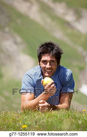 Man on the mountain Italy Piedmont Alps Formazza Valley. View Large Photo Image Stock Photo - Man on the mountain Italy Piedmont Alps Formazza Valley.. Fotosearch