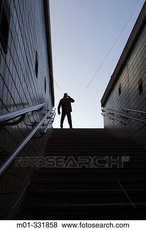Man on the top of the stairs View Large Photo Image Stock Photo - Man on the top of the stairs. Fotosearch