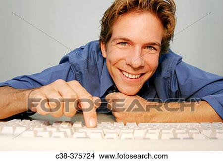 Picture - man online. Fotosearch