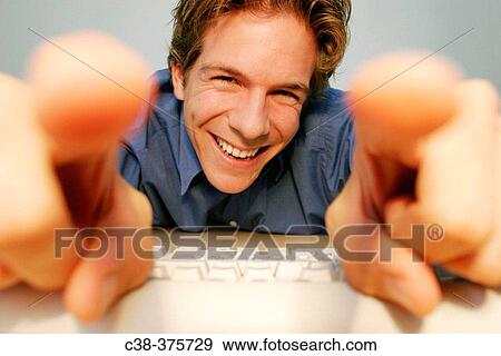 Stock Photo - man online. Fotosearch