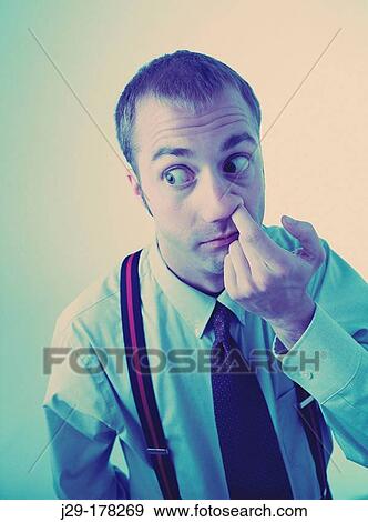 Man picking his nose View Large Photo Image Stock Photo - Man picking his nose. Fotosearch