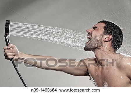 Man play with a shower View Large Photo Image Picture - Man play with a shower. Fotosearch
