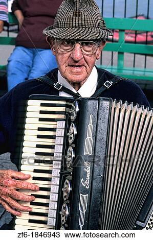 Man playing accordion in Cornwall England View Large Photo Image Stock Image - Man playing accordion in Cornwall England. Fotosearch