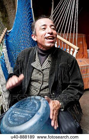 Man playing bottle drum View Large Photo Image Stock Photo - Man playing bottle drum. Fotosearch