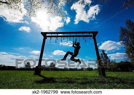 Man playing challenging game View Large Photo Image Stock Photo - Man playing challenging game. Fotosearch