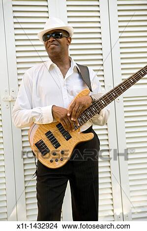 Man playing guitar. View Large Photo Image Picture - Man playing guitar.. Fotosearch