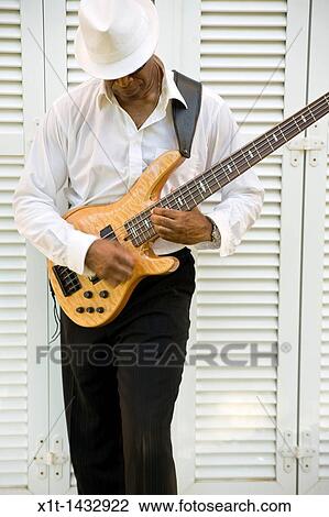 Man playing guitar. View Large Photo Image Stock Image - Man playing guitar.. Fotosearch