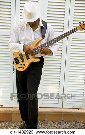 Man playing guitar. View Large Photo Image Stock Image - Man playing guitar.. Fotosearch