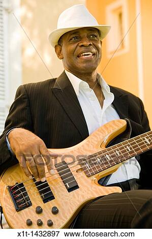 Man playing guitar. View Large Photo Image Stock Photo - Man playing guitar.. Fotosearch