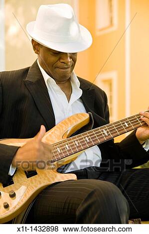 Man playing guitar. View Large Photo Image Stock Photo - Man playing guitar.. Fotosearch