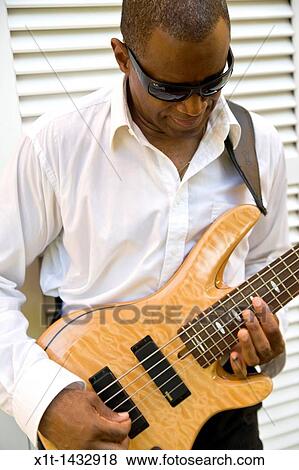 Man playing guitar. View Large Photo Image Stock Photo - Man playing guitar.. Fotosearch