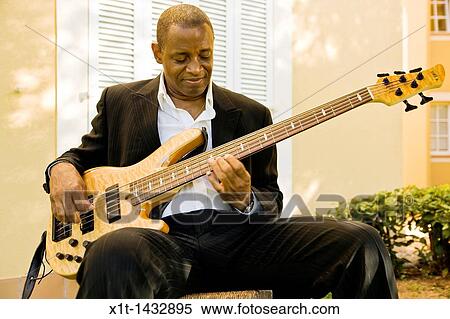 Man playing guitar. View Large Photo Image Stock Photography - Man playing guitar.. Fotosearch