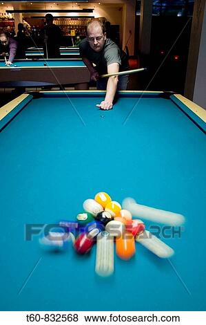 Man playing pool View Large Photo Image Stock Photo - Man playing pool. Fotosearch