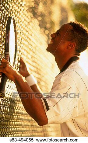 Man playing tennis View Large Photo Image Stock Photography - Man playing tennis. Fotosearch
