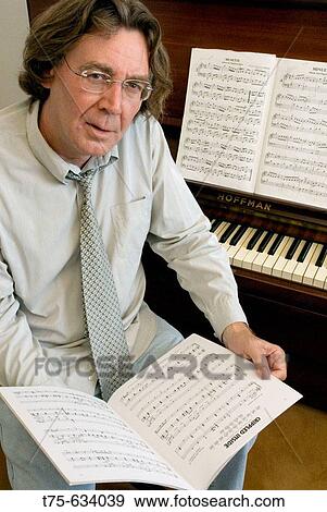 Man playing the piano View Large Photo Image Stock Photo - Man playing the piano. Fotosearch