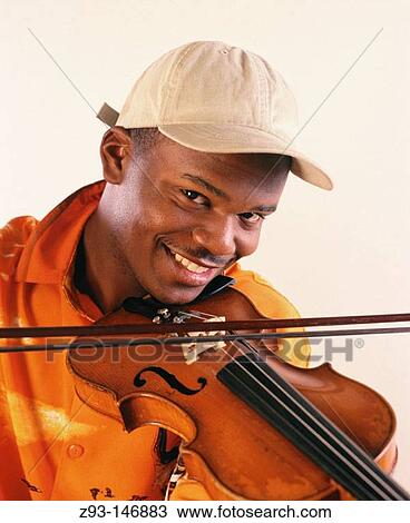 Man playing the violin View Large Photo Image Stock Image - Man playing the violin. Fotosearch