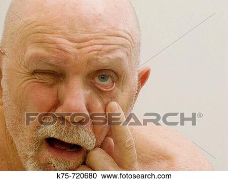 Man pointing to his eye View Large Photo Image Stock Image - Man pointing to his eye. Fotosearch